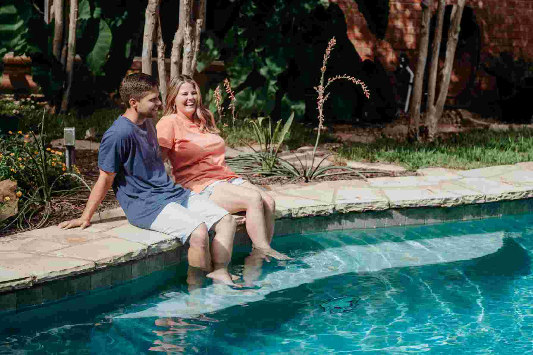 Couple sitting by a swimming pool, featuring Clear Choice Pool Care, highlighting Pool-Coping, and aligning with the page's context.