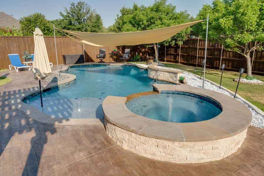 Image of a pool with a sun shade and jacuzzi, featuring text overlay 